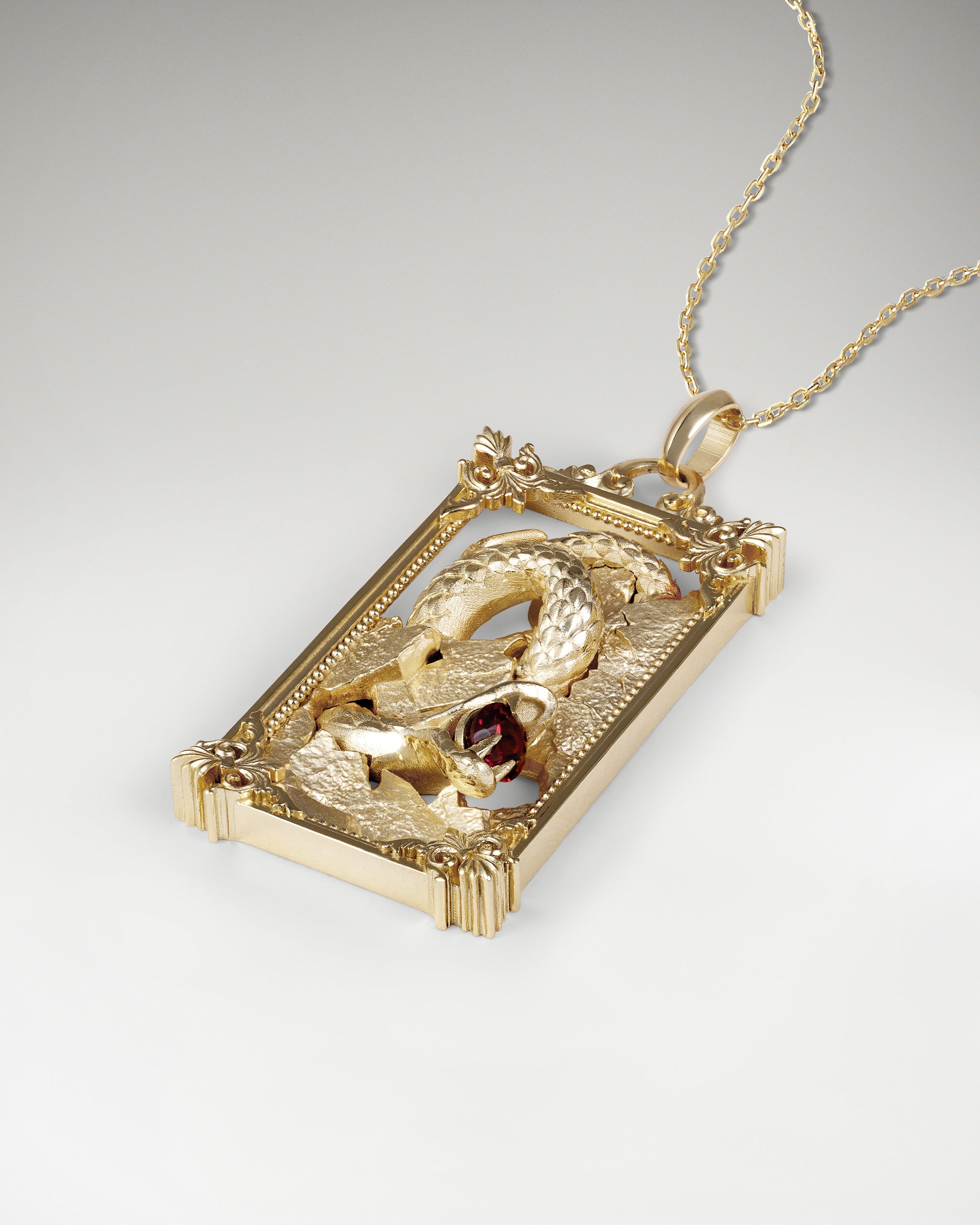 Serpent Canvas Pendant Necklace With Garnet