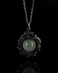 Wreathed Dragon Pendant In Nickel Silver With Guatemalan Jade